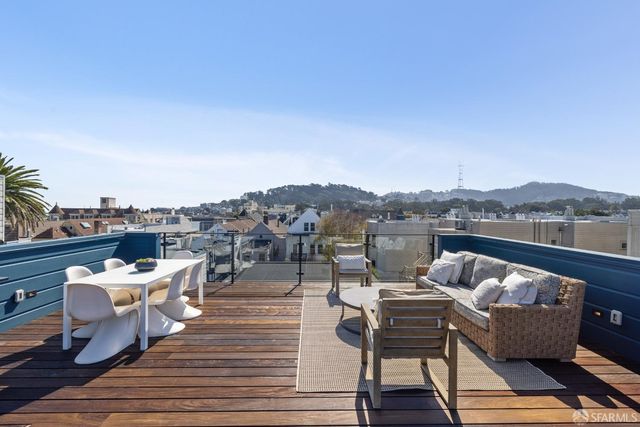 a view of a terrace with seating space