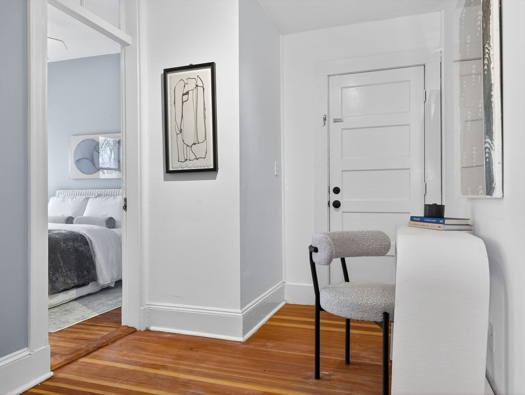 32 Robinwood Avenue, Unit 7 Boston, MA 02130 - Photo 7 of 24 a view of a hallway with furniture and entryway