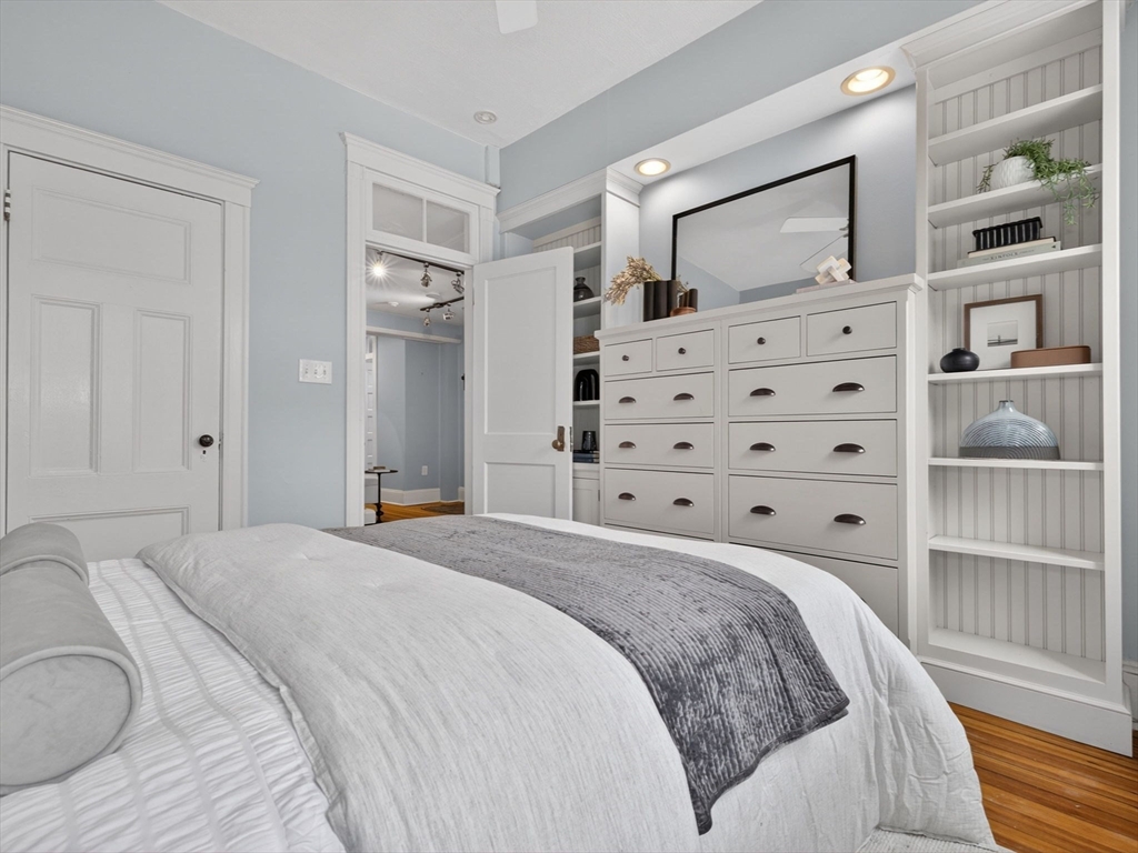 32 Robinwood Avenue, Unit 7 Boston, MA 02130 - Photo 10 of 24 a bedroom with a large bed and a window