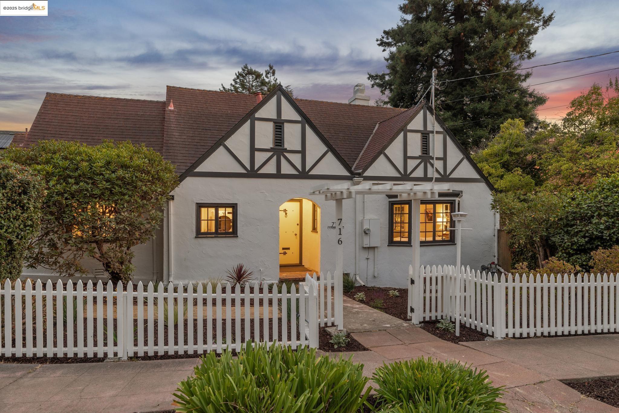 716 Coventry Road Kensington, CA 94707 - Photo 1 of 1 a front view of a house with iron fence