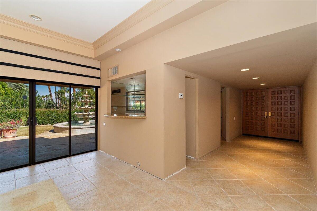 40885 Thunderbird Road Rancho Mirage, CA 92270 - Photo 15 of 61 a view of an empty room with a window