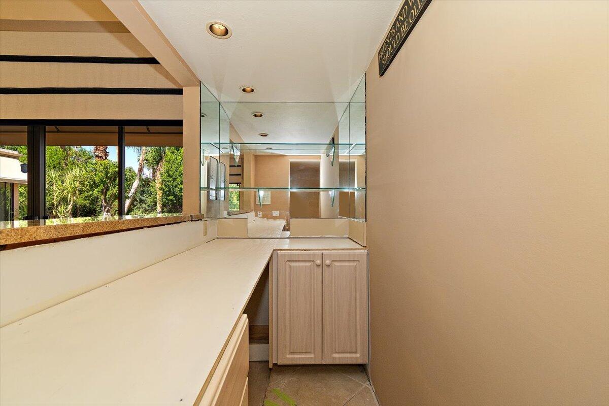 40885 Thunderbird Road Rancho Mirage, CA 92270 - Photo 16 of 61 a room with a sink and large window