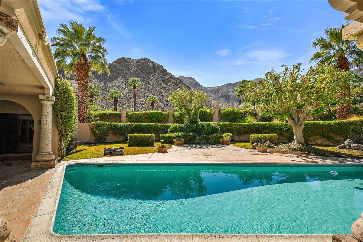 40885 Thunderbird Road Rancho Mirage, CA 92270 - Photo 23 of 61 a view of a house with a big yard