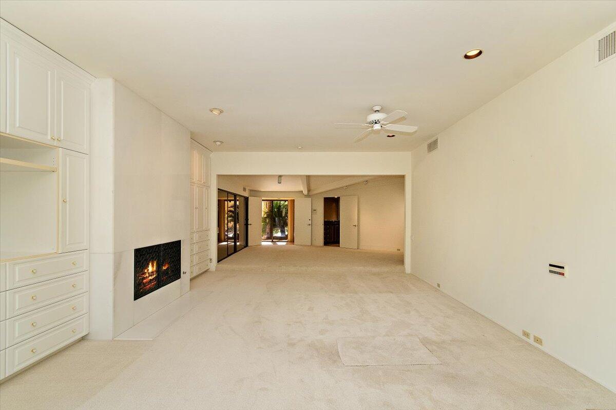 40885 Thunderbird Road Rancho Mirage, CA 92270 - Photo 32 of 61 a view of a livingroom with a fireplace