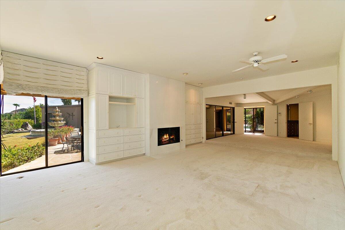 40885 Thunderbird Road Rancho Mirage, CA 92270 - Photo 33 of 61 a view of a livingroom with an empty space and a fireplace
