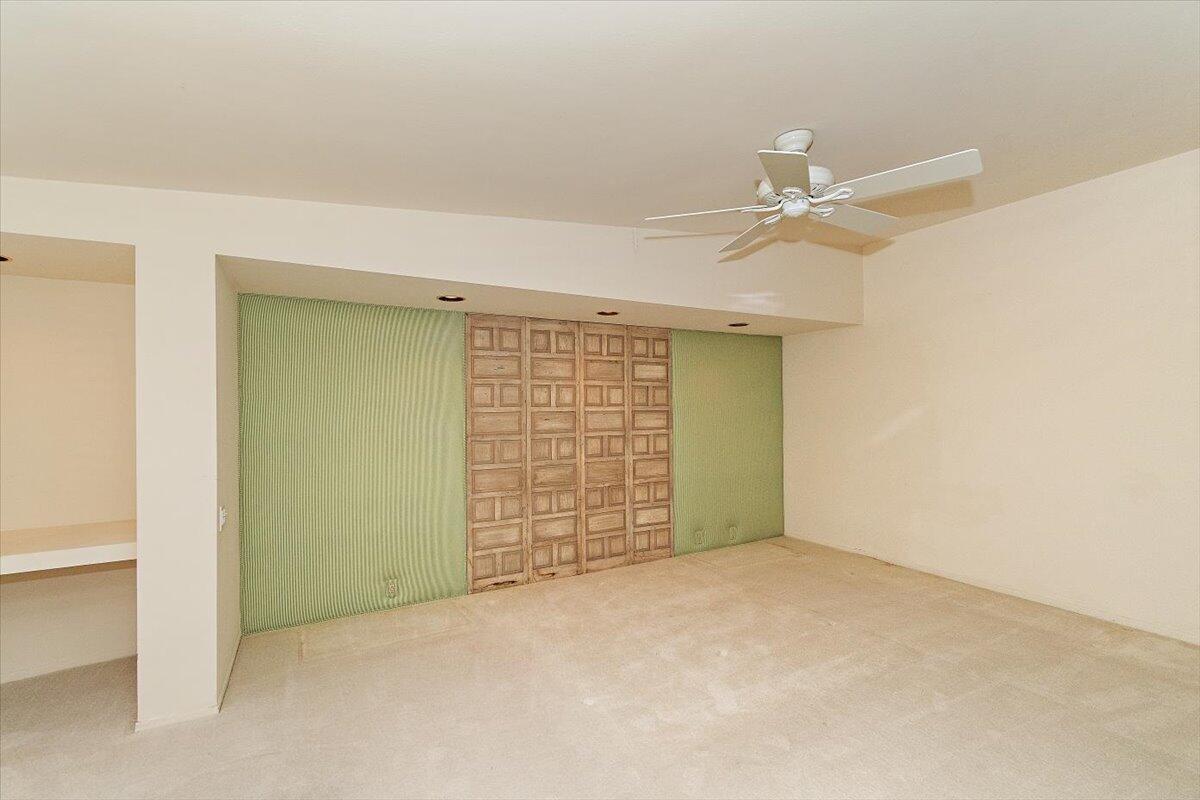 40885 Thunderbird Road Rancho Mirage, CA 92270 - Photo 39 of 61 an empty room with closet and fan