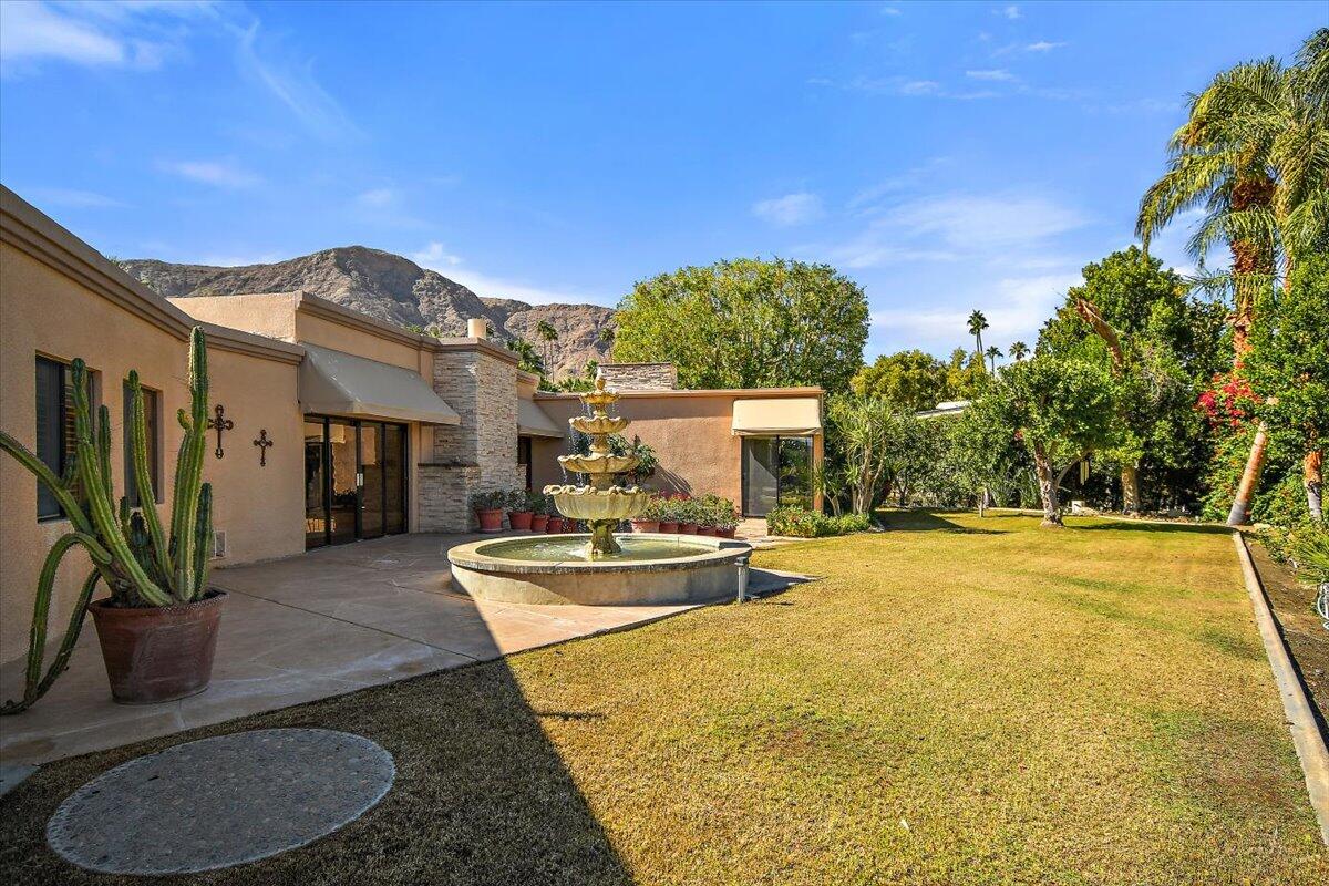 40885 Thunderbird Road Rancho Mirage, CA 92270 - Photo 46 of 61 a view of a house with backyard and sitting area