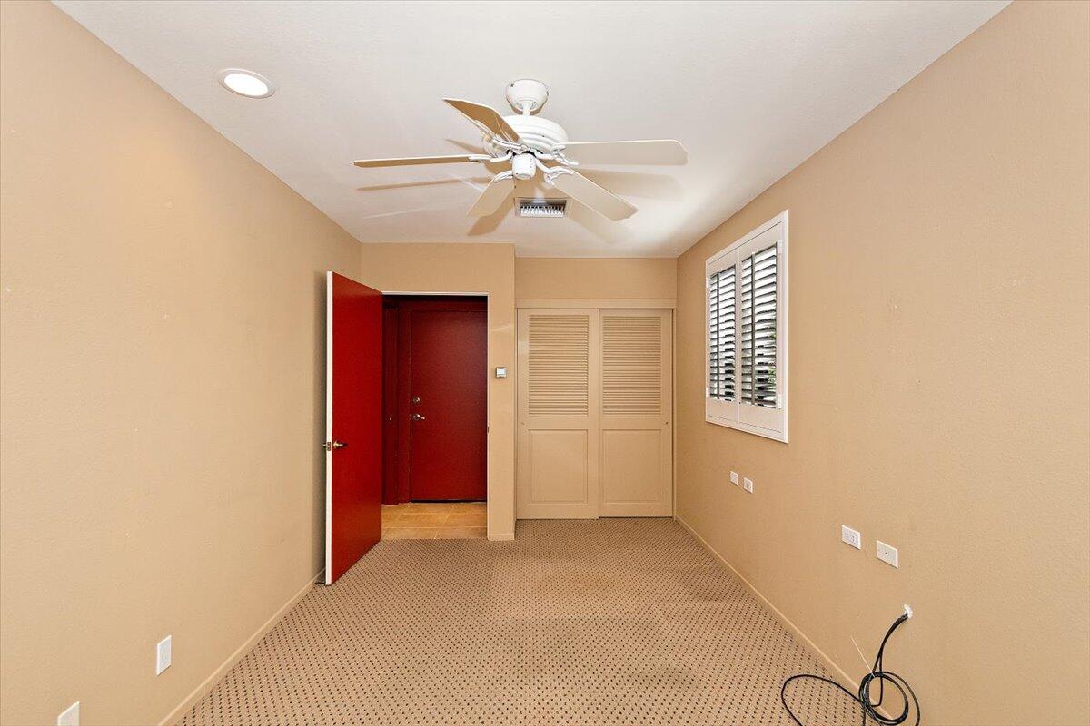 40885 Thunderbird Road Rancho Mirage, CA 92270 - Photo 54 of 61 a view of an empty room with a window