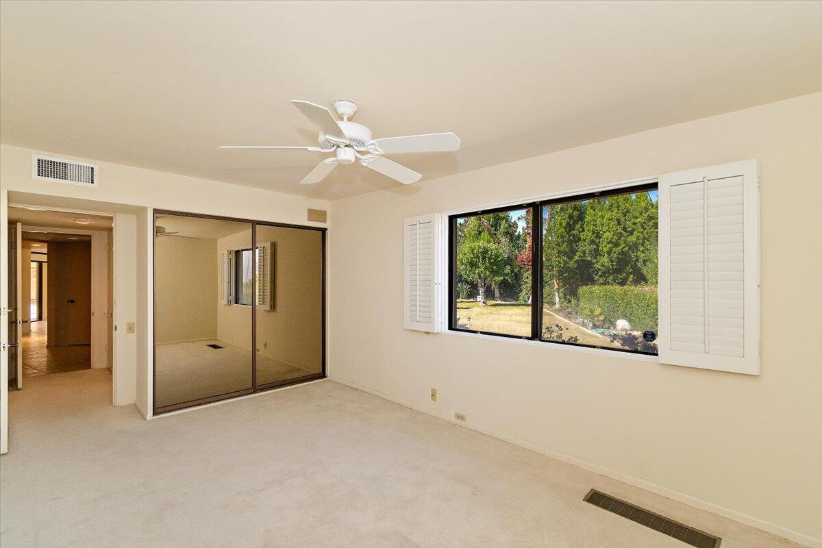 40885 Thunderbird Road Rancho Mirage, CA 92270 - Photo 56 of 61 an empty room with windows and closet