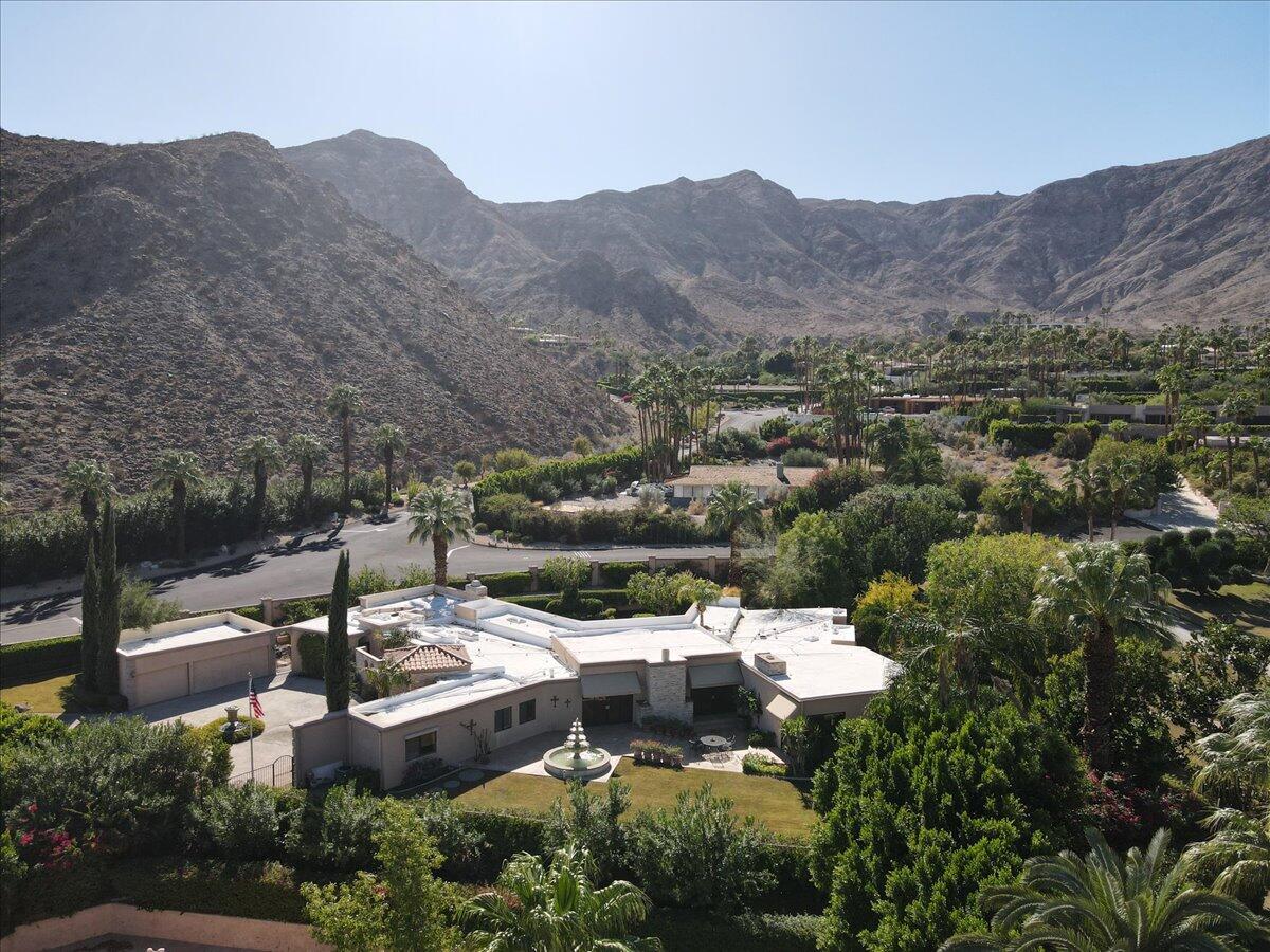 40885 Thunderbird Road Rancho Mirage, CA 92270 - Photo 58 of 61 an aerial view of a house with mountain view