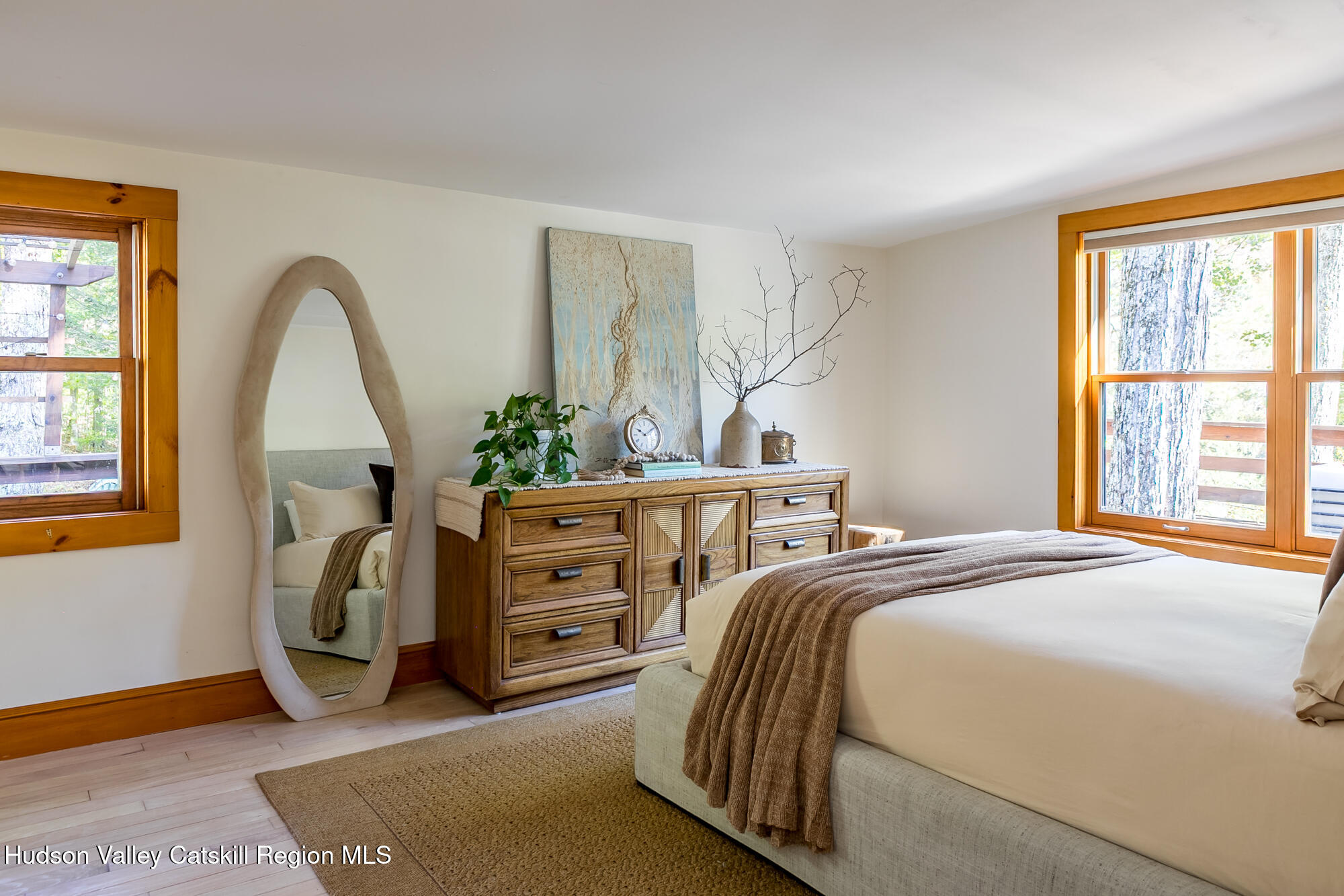 439 Silver Hollow Road Chichester, NY 12416 - Photo 12 of 36 a bedroom with a bed and a window