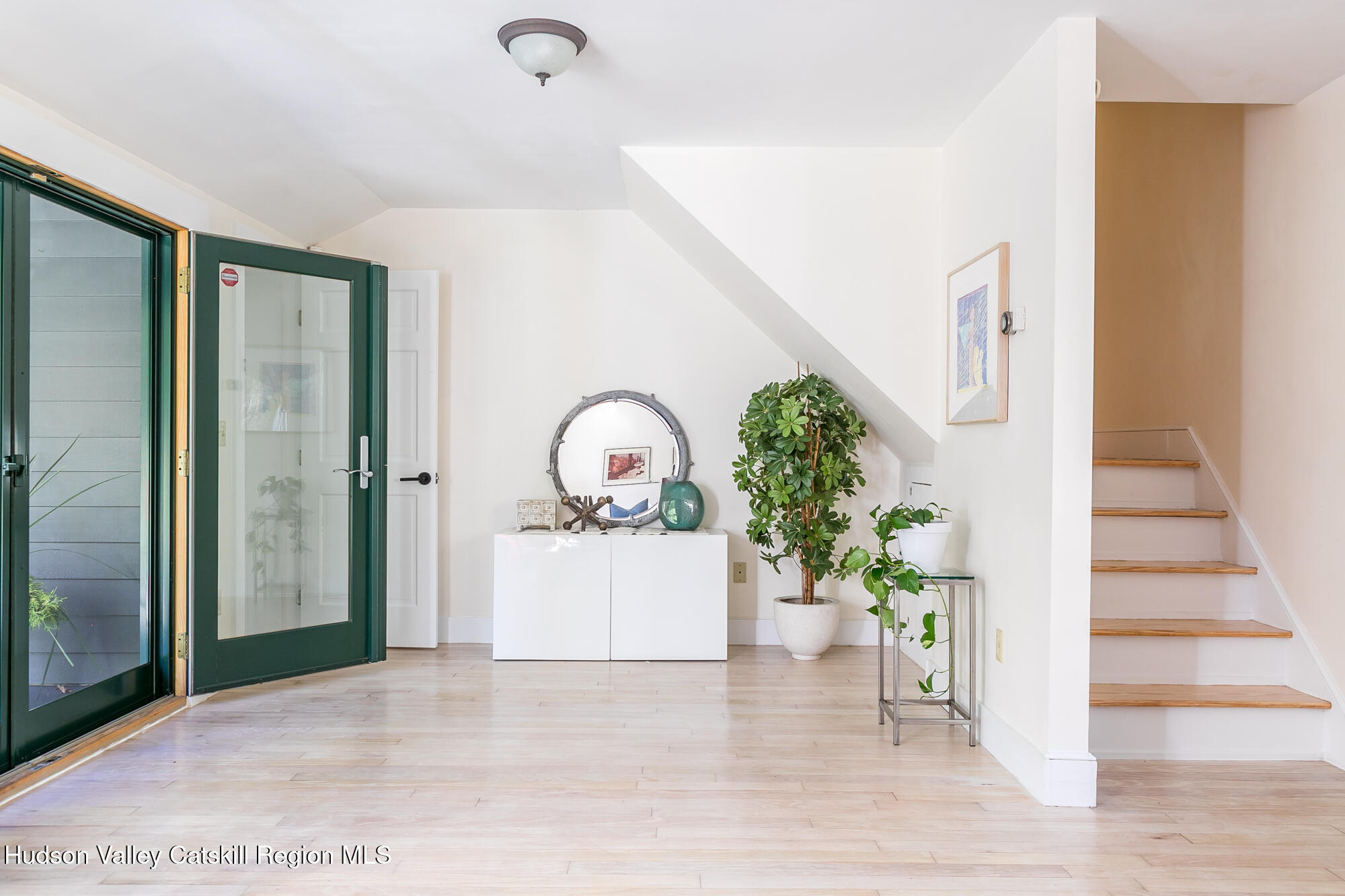 439 Silver Hollow Road Chichester, NY 12416 - Photo 15 of 36 an entryway with wooden floor and a potted plant