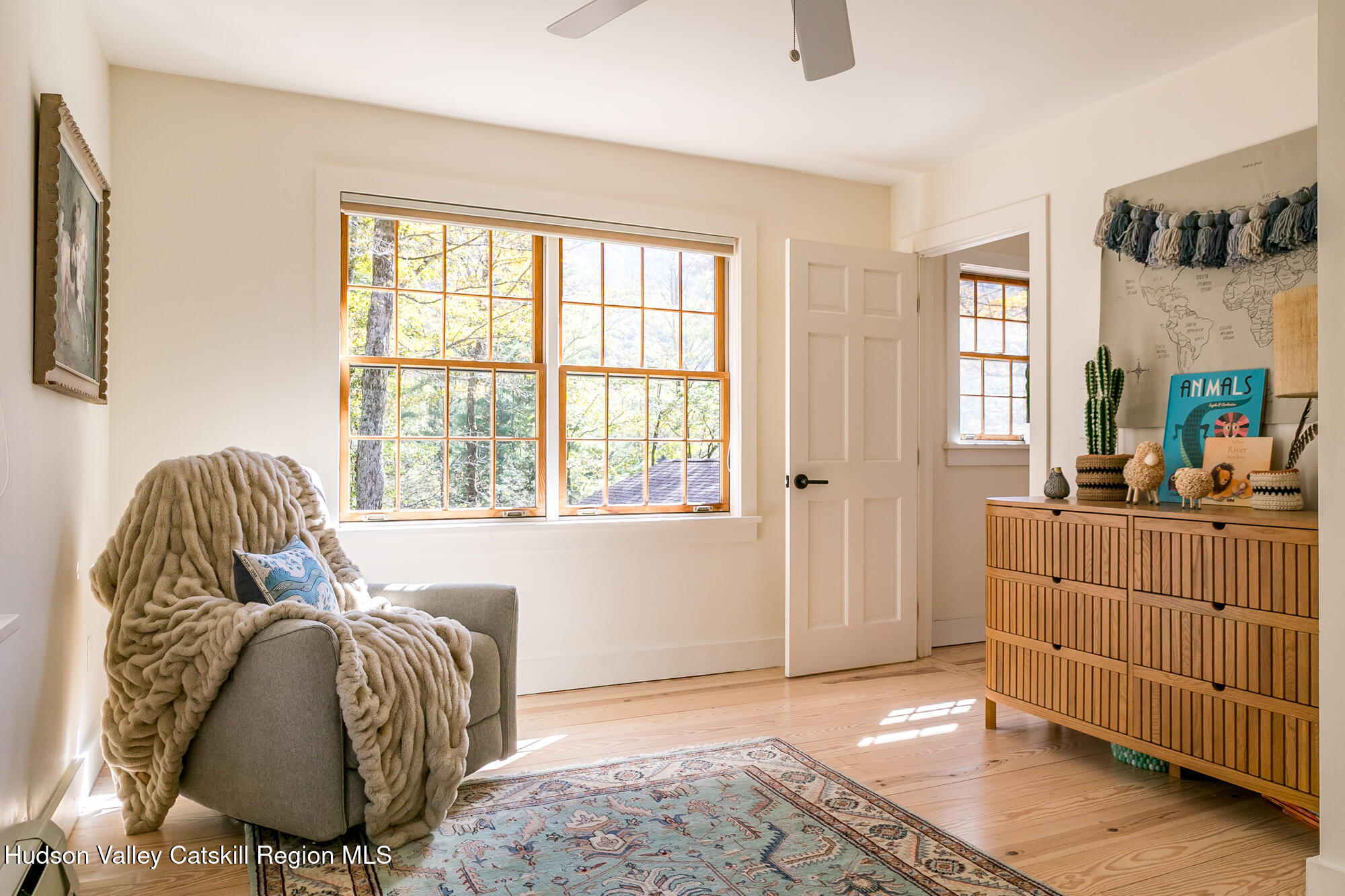439 Silver Hollow Road Chichester, NY 12416 - Photo 17 of 36 a bed room with a bed and a window