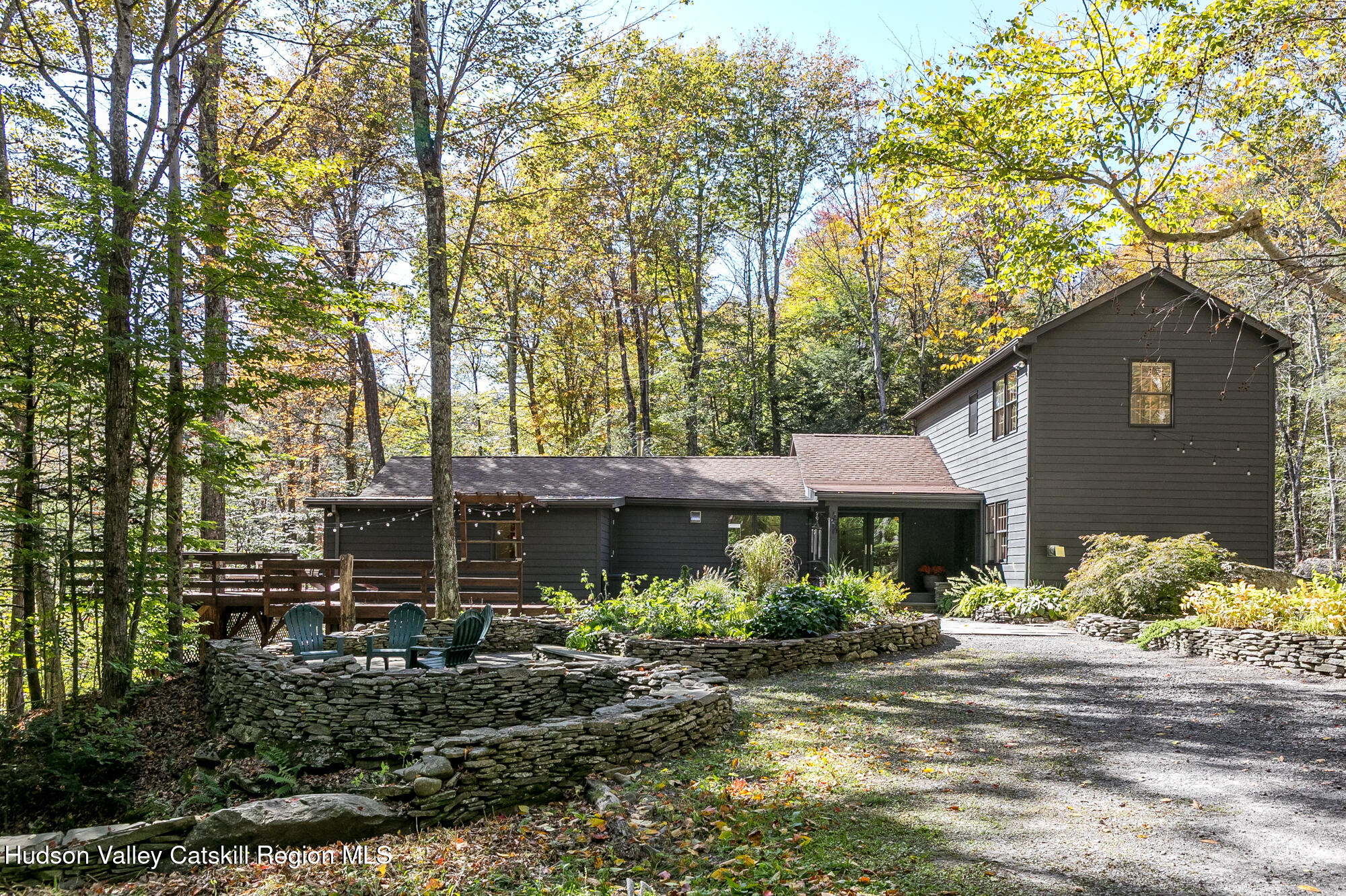 439 Silver Hollow Road Chichester, NY 12416 - Photo 2 of 36 a front view of a house with garden