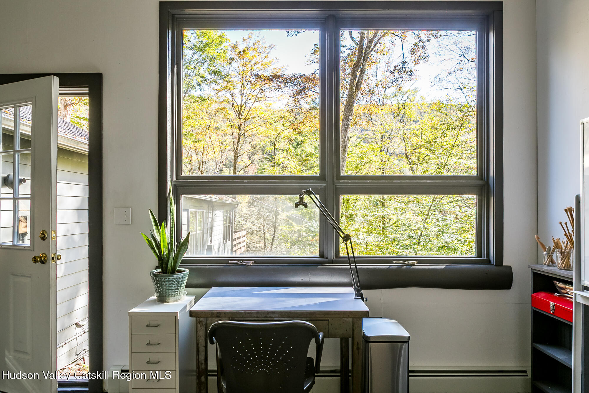 439 Silver Hollow Road Chichester, NY 12416 - Photo 22 of 36 a living room with furniture and a window