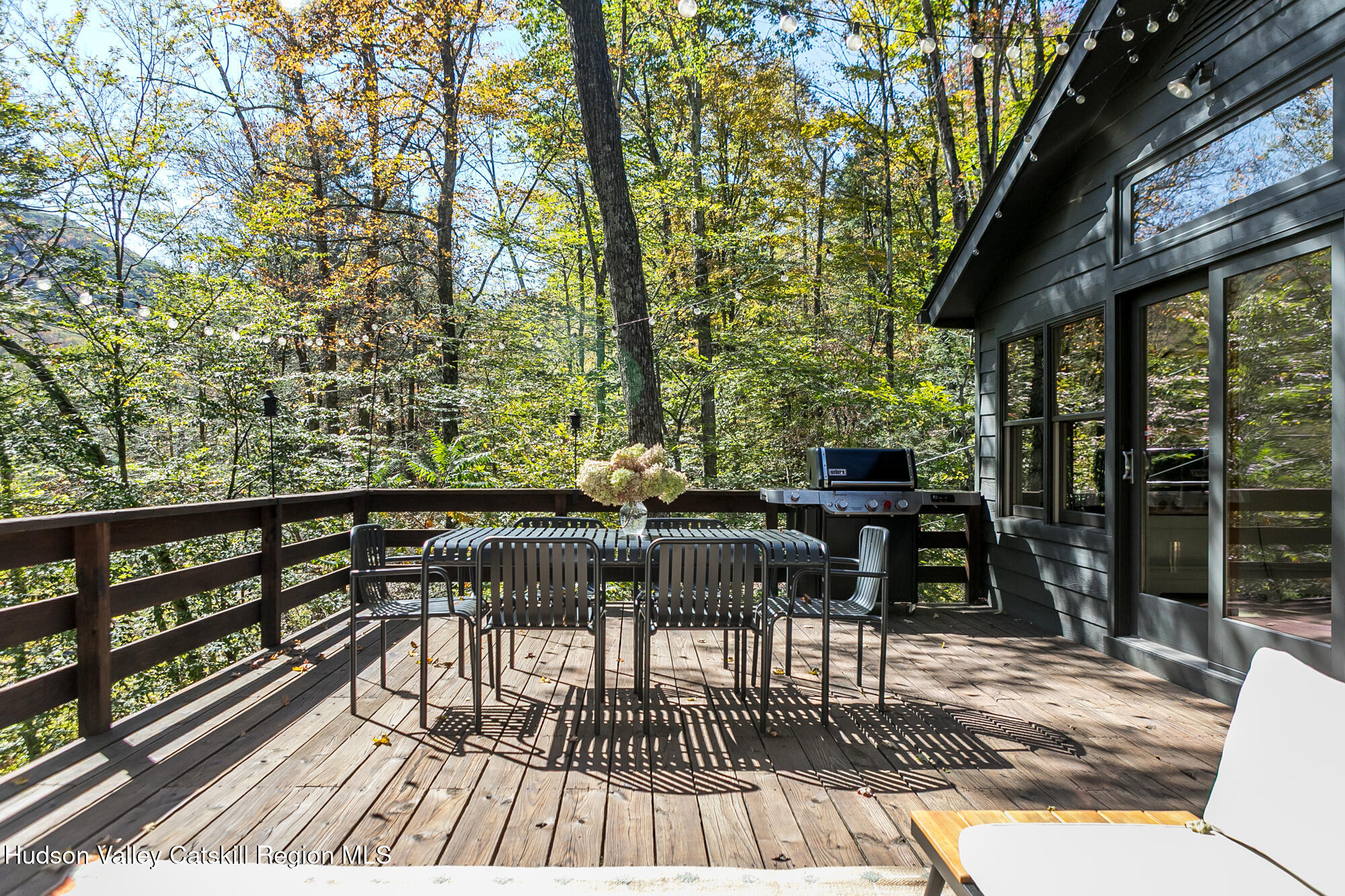 439 Silver Hollow Road Chichester, NY 12416 - Photo 26 of 36 a view of balcony with chairs and wooden fence