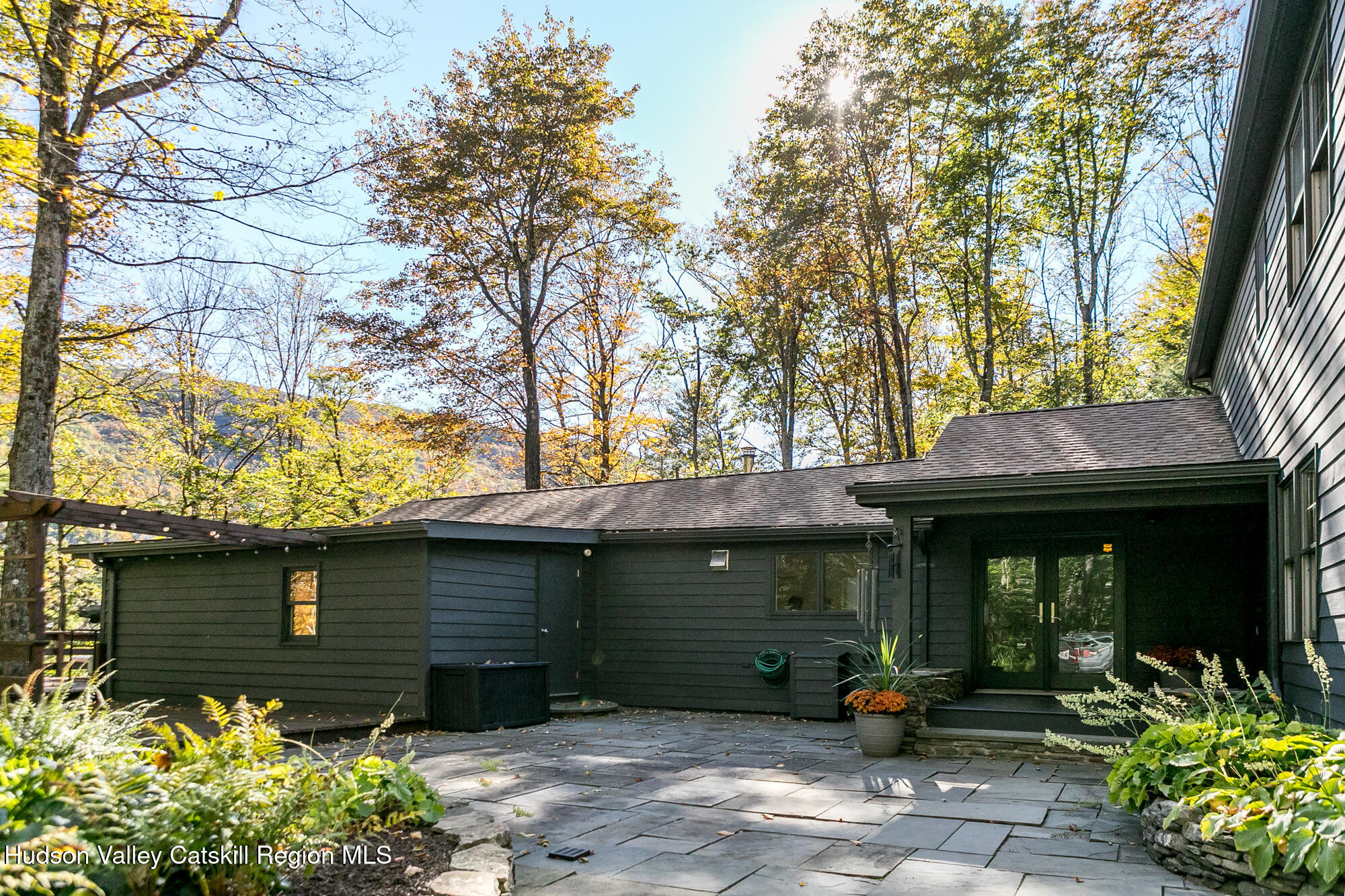 439 Silver Hollow Road Chichester, NY 12416 - Photo 28 of 36 a front view of a house with garden