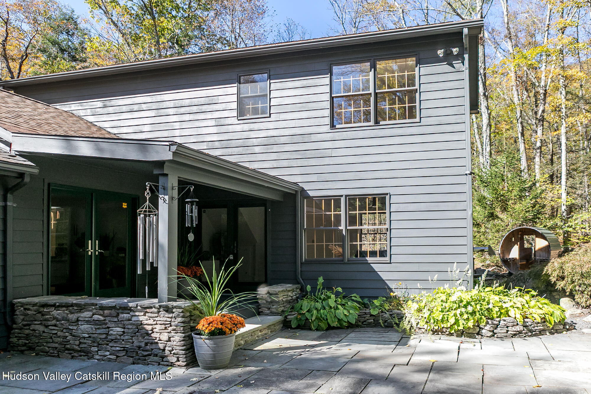 439 Silver Hollow Road Chichester, NY 12416 - Photo 30 of 36 a view of brick house with potted plants