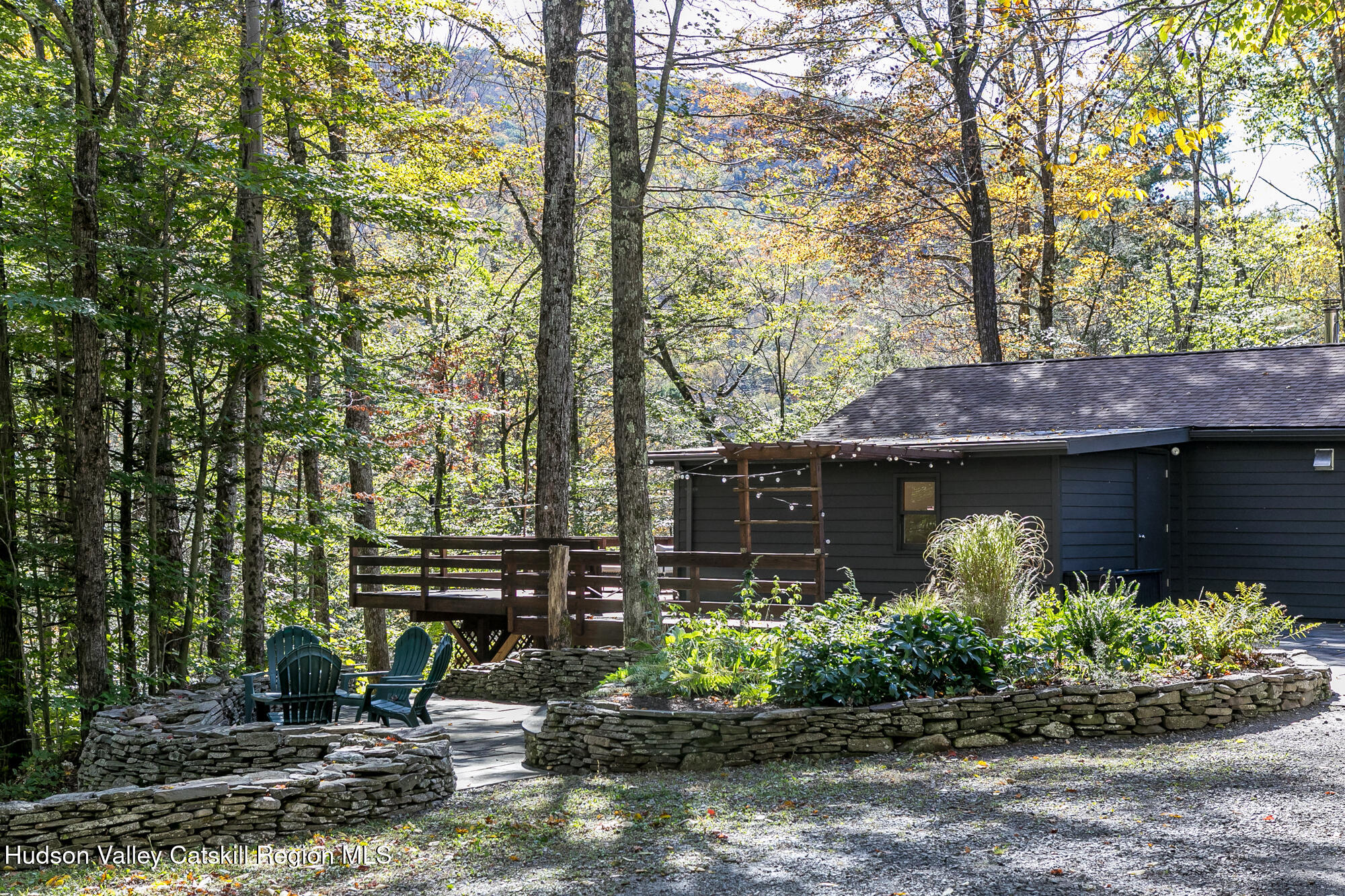 439 Silver Hollow Road Chichester, NY 12416 - Photo 31 of 36 a front view of a house with garden