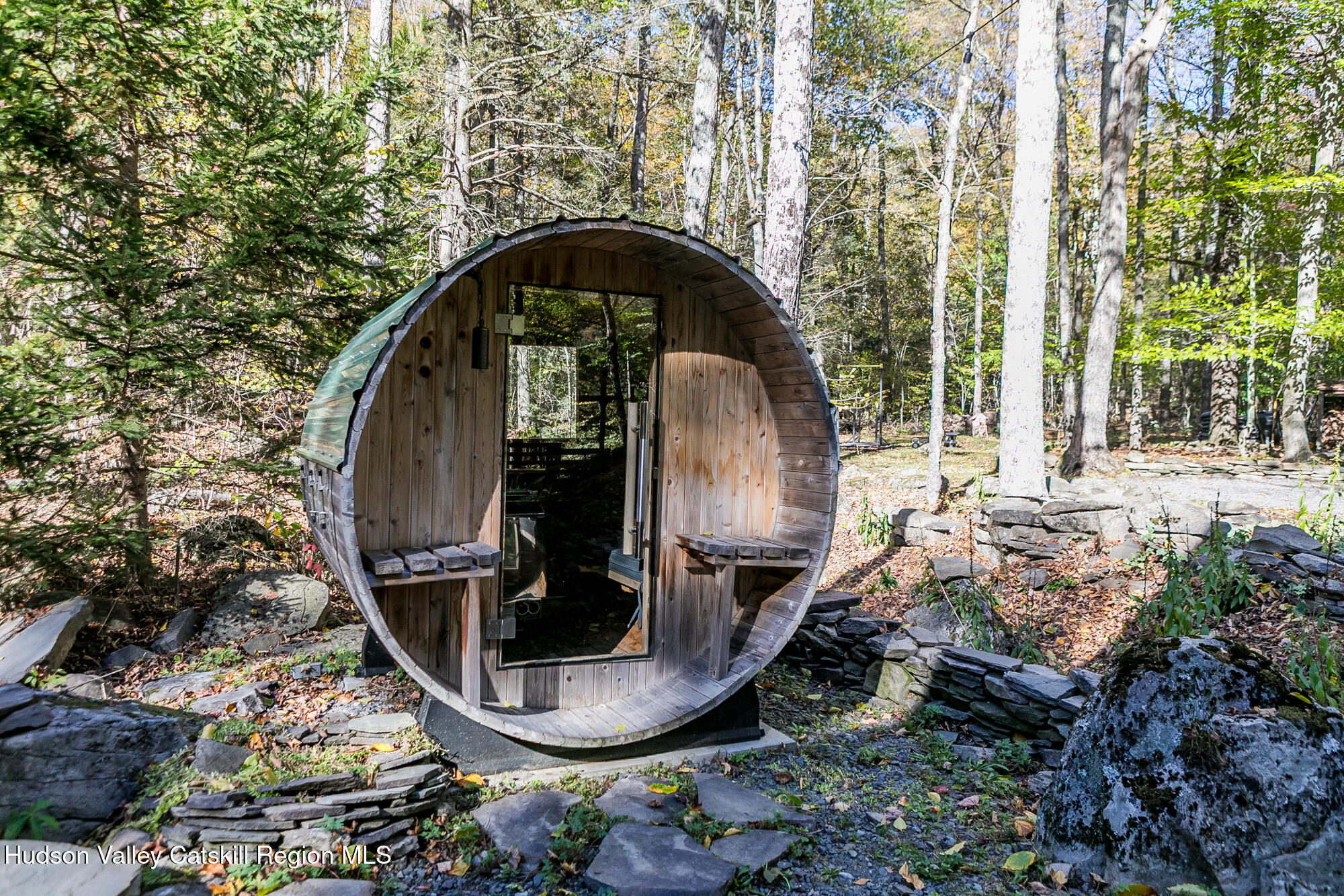 439 Silver Hollow Road Chichester, NY 12416 - Photo 34 of 36 a backyard of a house with outdoor seating