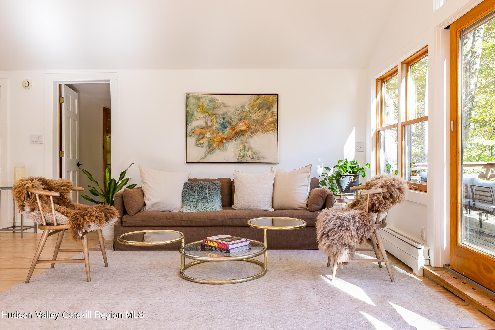 439 Silver Hollow Road Chichester, NY 12416 - Photo 5 of 36 a living room with furniture and a large window