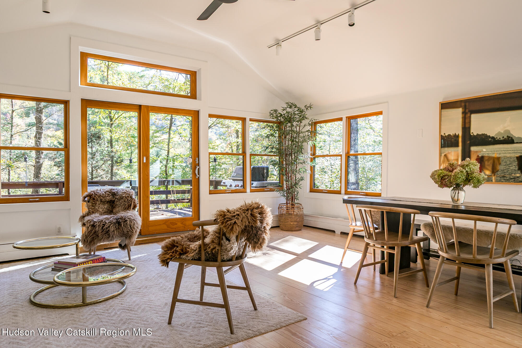 439 Silver Hollow Road Chichester, NY 12416 - Photo 6 of 36 a living room with furniture and floor to ceiling windows