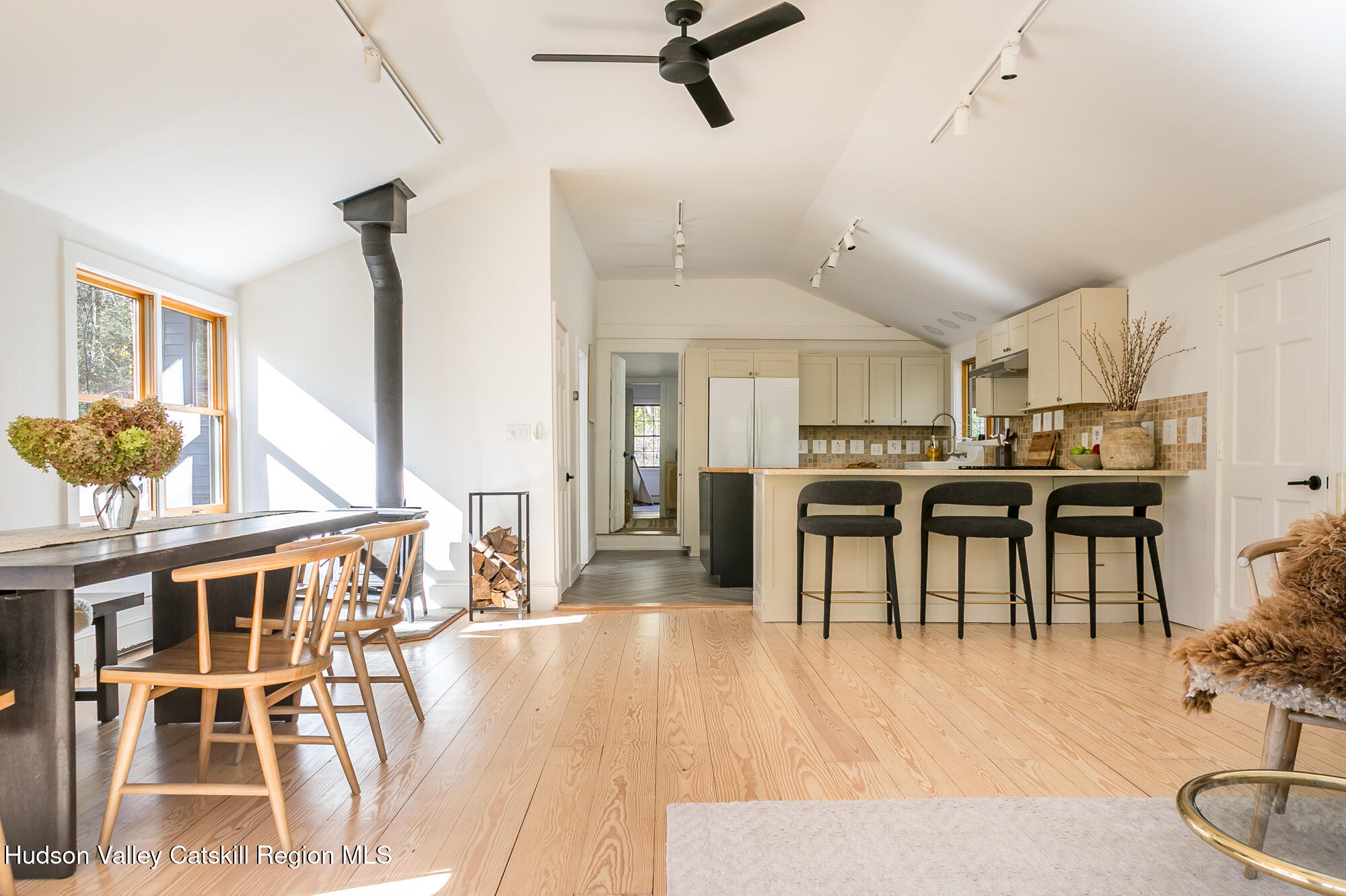439 Silver Hollow Road Chichester, NY 12416 - Photo 8 of 36 a living room with stainless steel appliances kitchen island granite countertop furniture and a kitchen view