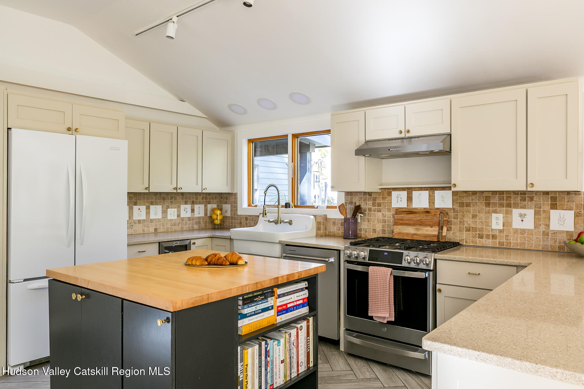 439 Silver Hollow Road Chichester, NY 12416 - Photo 10 of 36 a kitchen with kitchen island a sink stove and cabinets