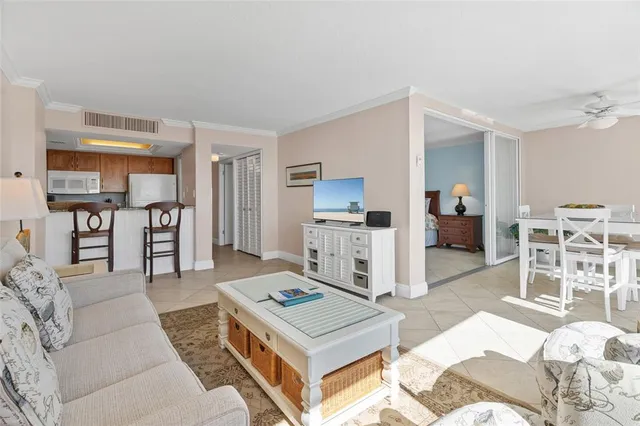 a living room with furniture and a table