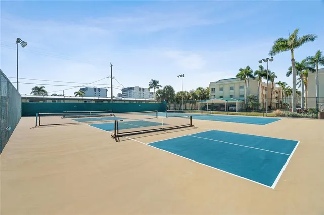 a view of swimming pool with outdoor seating and yard