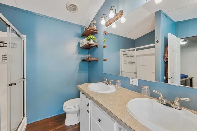 a view of a patio with a table and chairs