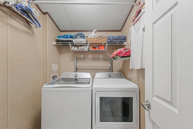 a view of house with outdoor space and garden