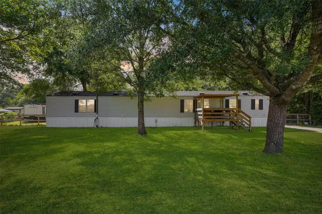 a view of an chairs and tables in the balcony