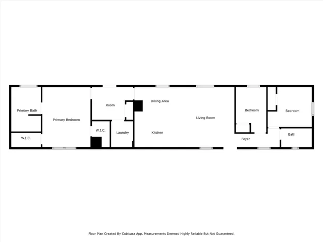 an aerial view of residential house with outdoor space and trees all around