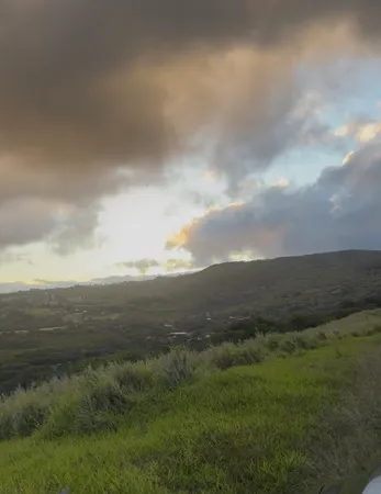 a view of an ocean and mountain