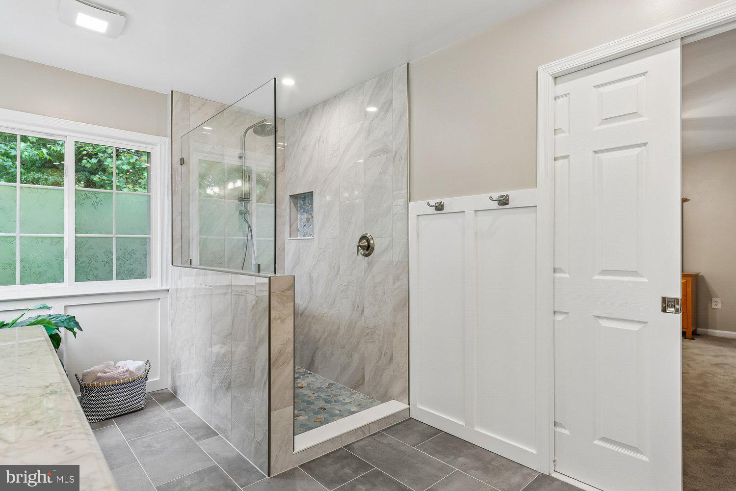 3707 Turn Back Trail Triangle, VA 22172 - Photo 33 of 55 a bathroom with a shower and a sink