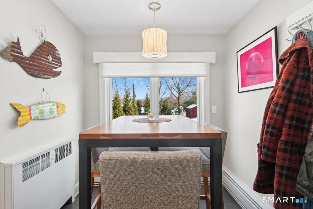 30 Windy Ridge Place Trumbull, CT 06611 - Photo 13 of 39 Dining area in eat-in kitchen overlooking back yard. (Access to garage on right).