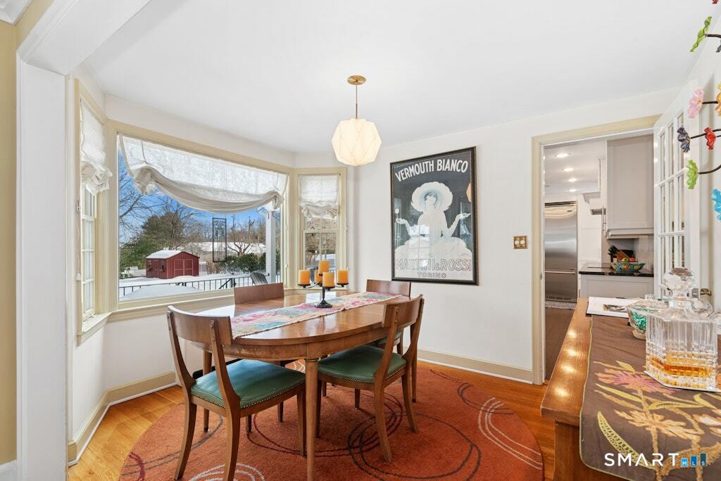 30 Windy Ridge Place Trumbull, CT 06611 - Photo 9 of 39 Formal dining room with picture window and hardwood flooring.