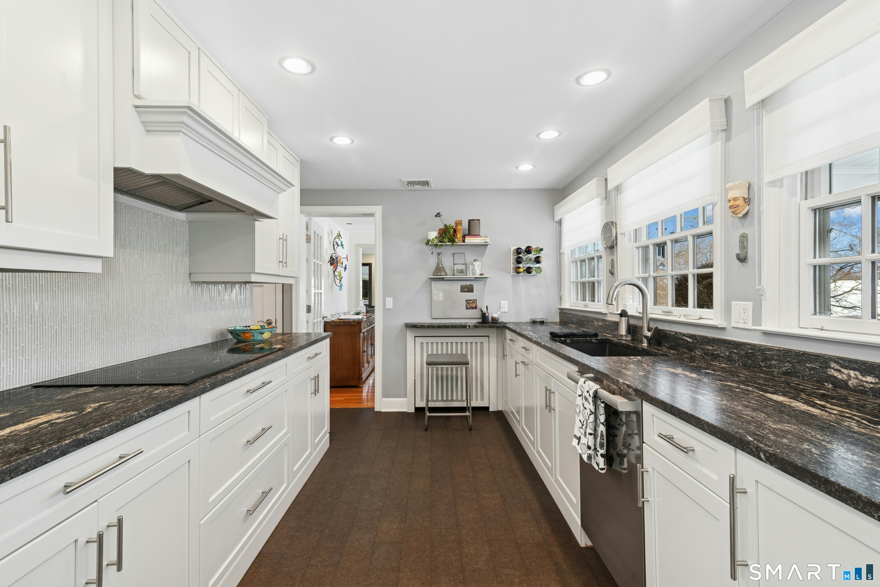 30 Windy Ridge Place Trumbull, CT 06611 - Photo 10 of 39 Galley kitchen with custom wood cabinetry including lift for mixer.
