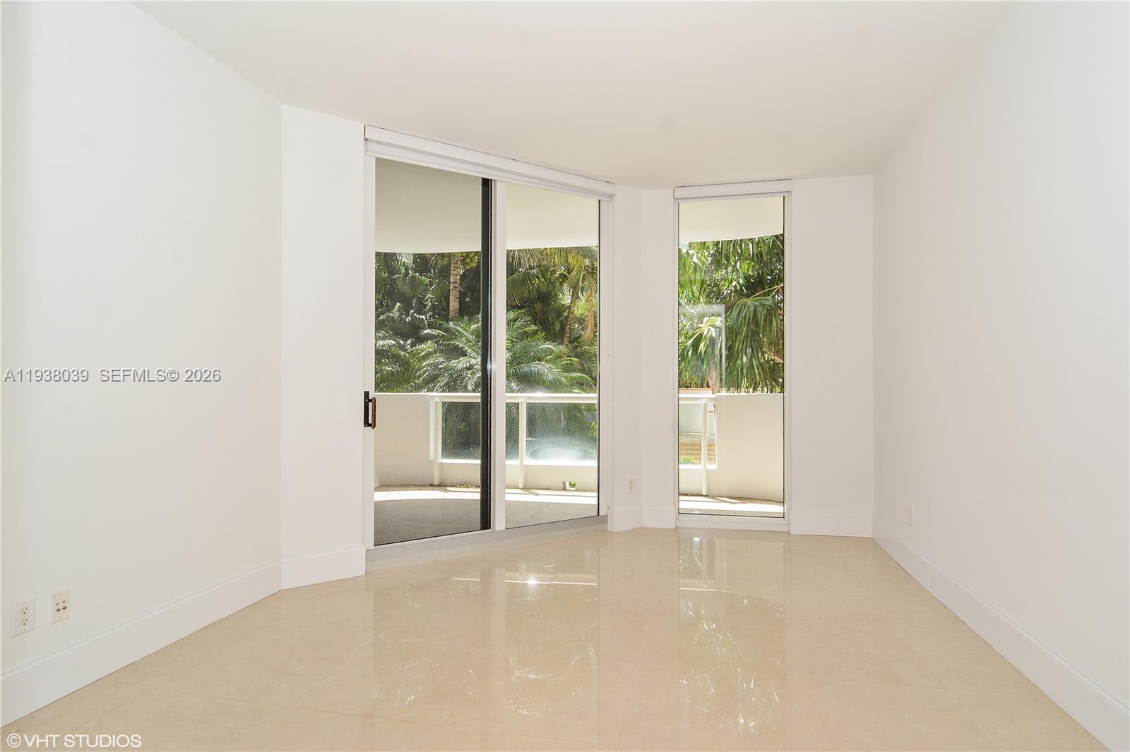 21200 Point Place, Unit 404 Aventura, FL 33180 - Photo 11 of 22 a view of an empty room with a window
