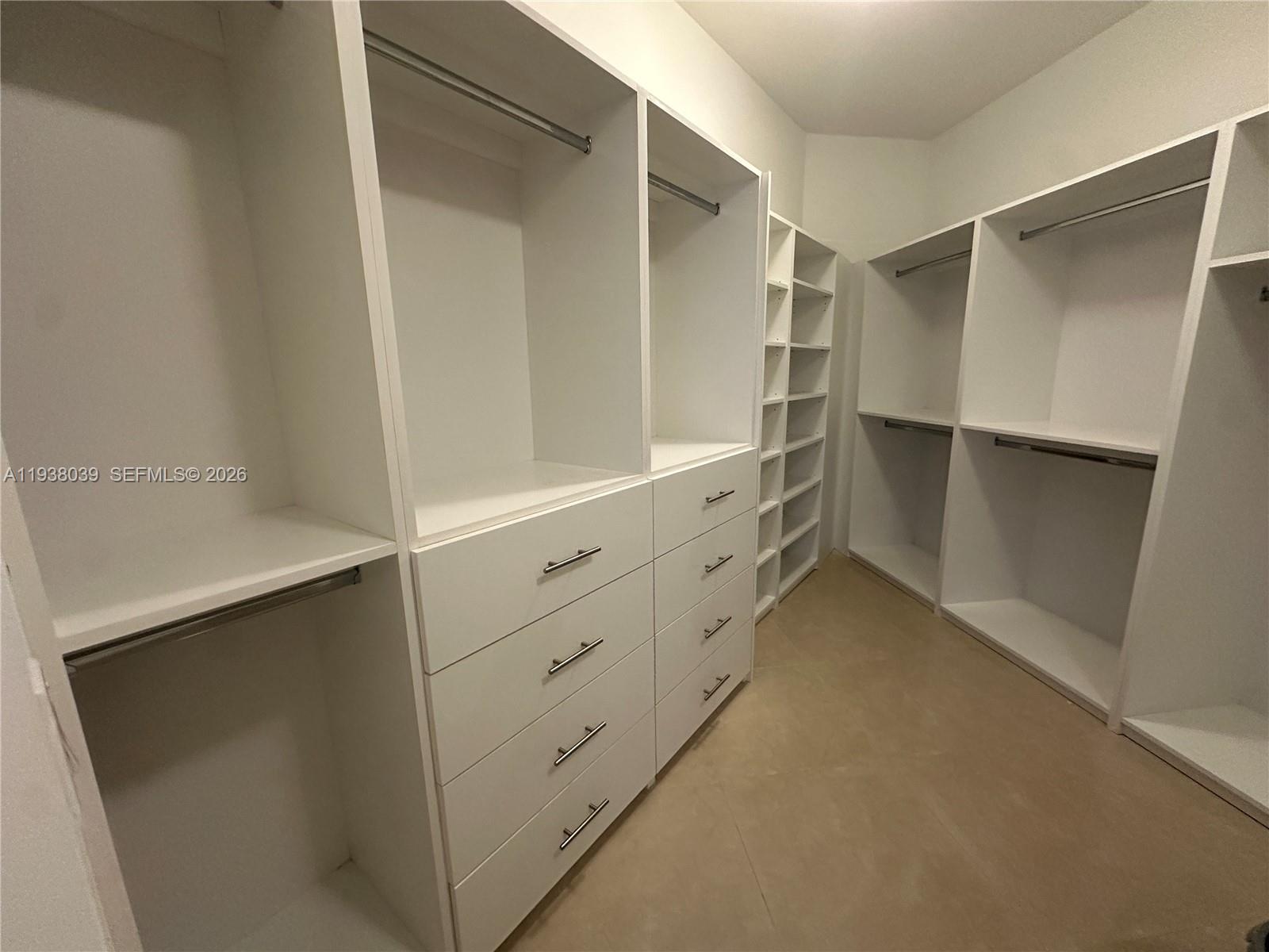 21200 Point Place, Unit 404 Aventura, FL 33180 - Photo 10 of 22 a view of walk in closet