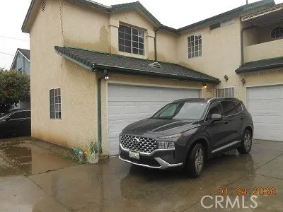 a car parked in front of a house
