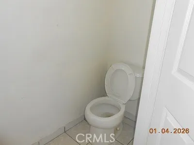 a close view of a toilet and a sink