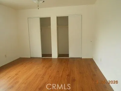 an empty room with a wooden door