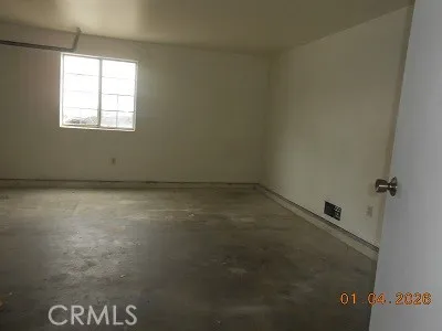 a view of a backyard of the house