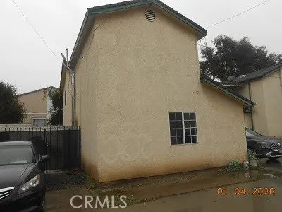 a house with trees in front of it