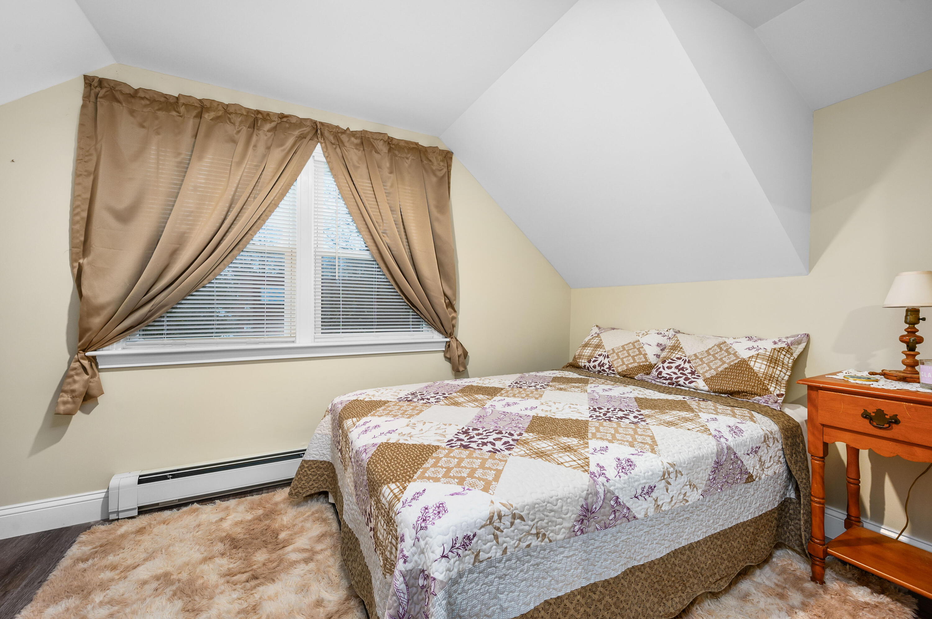 70 High School Road Hyannis, MA 02601 - Photo 11 of 23 a bedroom with a bed and a window