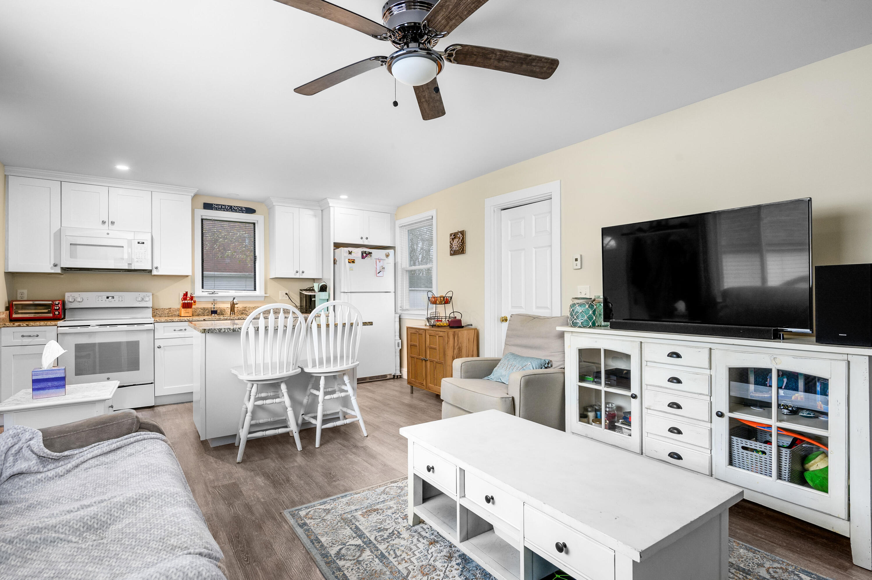 70 High School Road Hyannis, MA 02601 - Photo 15 of 23 a living room with furniture and a flat screen tv