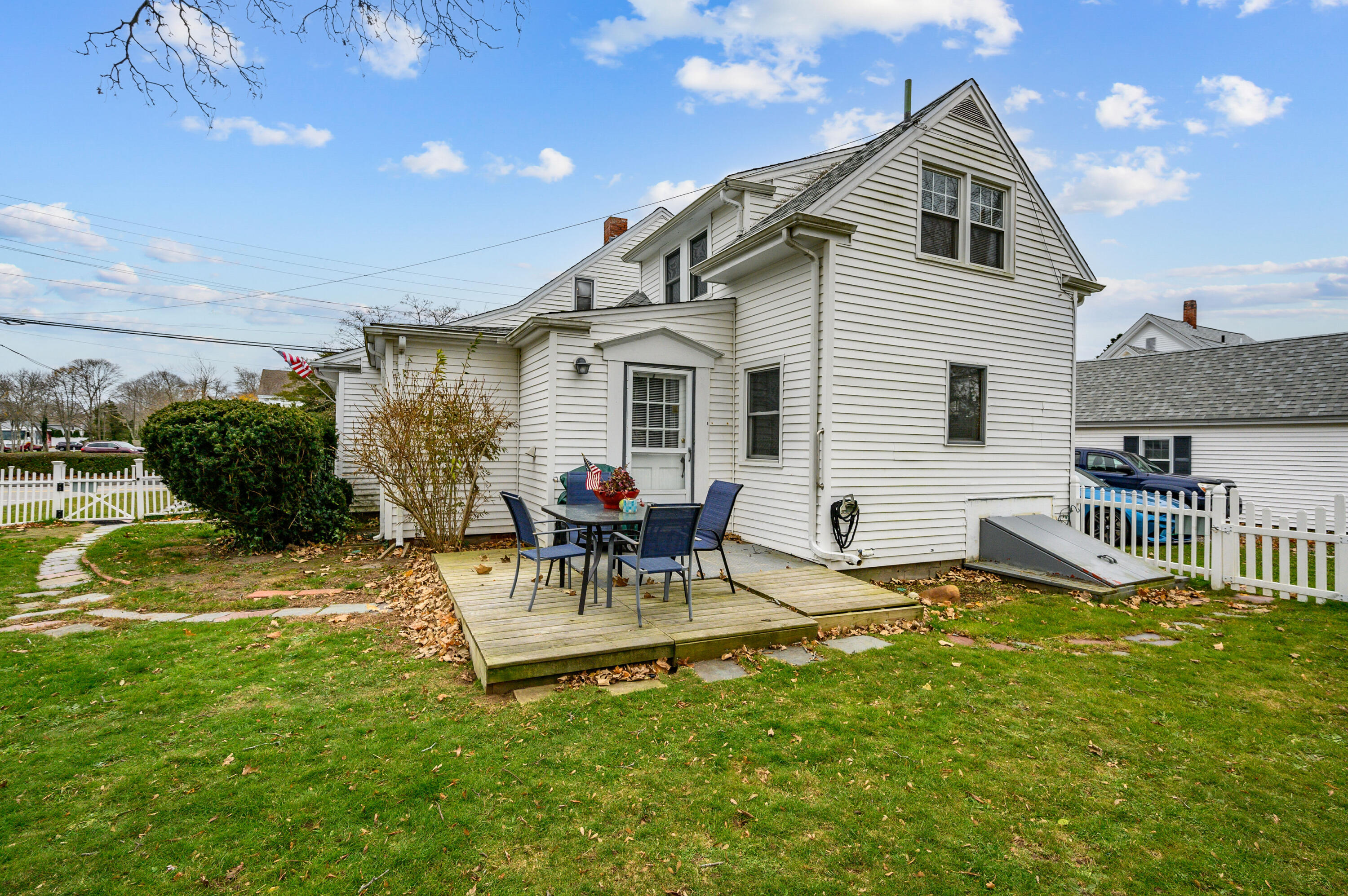 70 High School Road Hyannis, MA 02601 - Photo 20 of 23 a view of a house with backyard and sitting area
