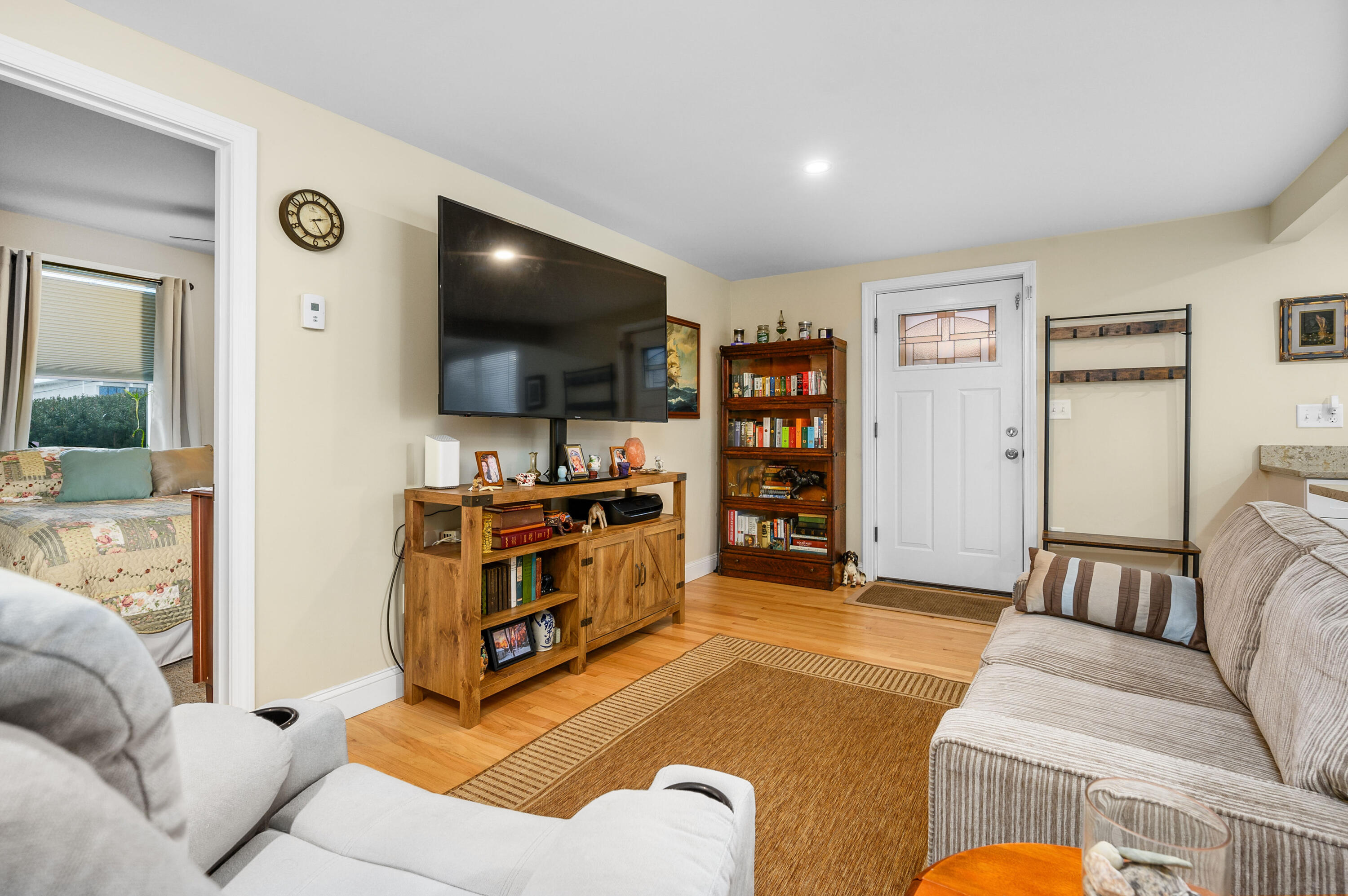 70 High School Road Hyannis, MA 02601 - Photo 4 of 23 a living room with furniture and a flat screen tv